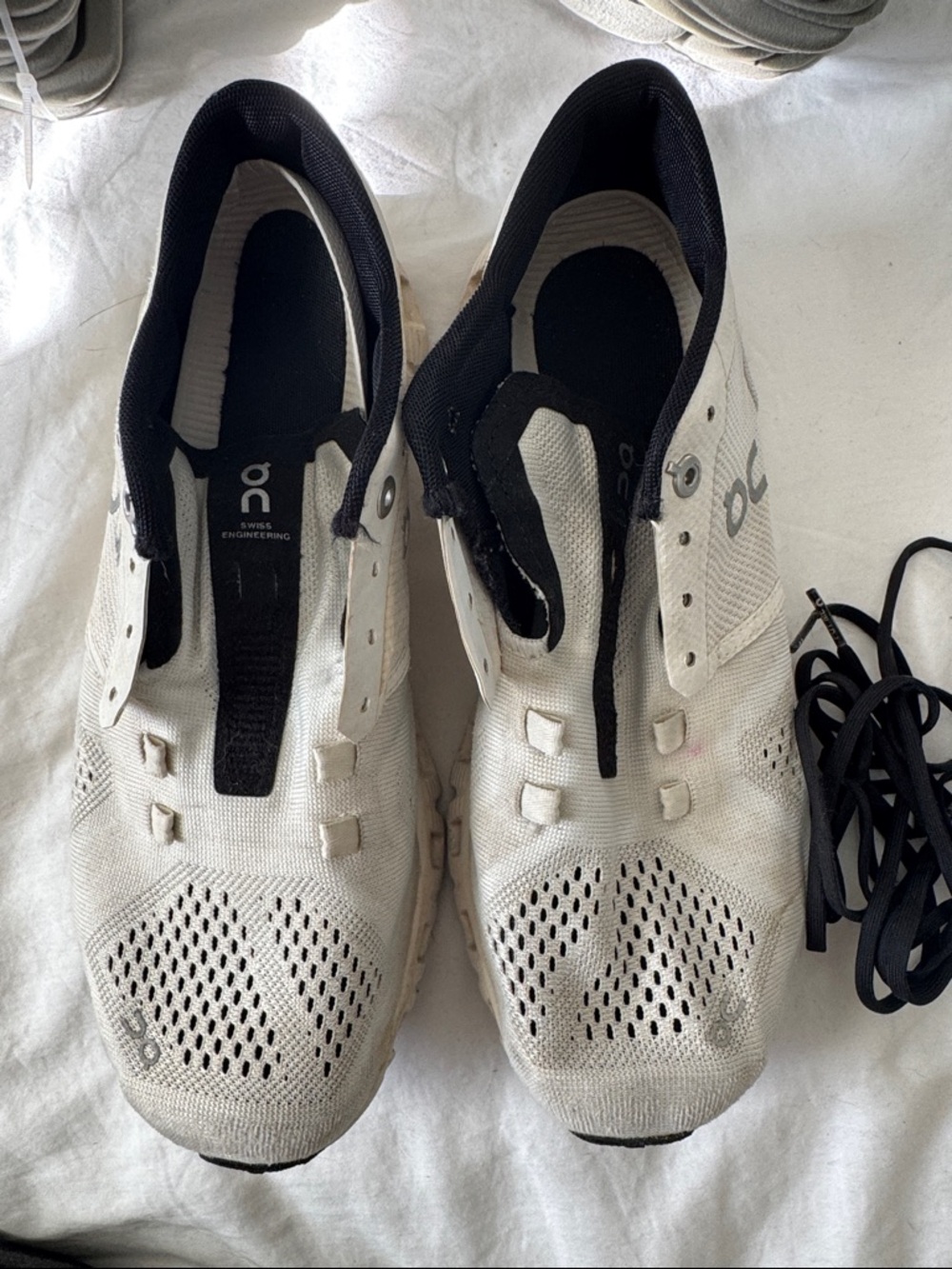 On Running White and Black Knit Athletic Sneakers